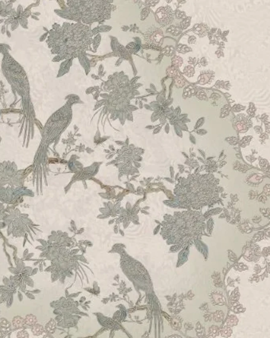 A richly layered dupatta pattern of birds, florals and elephants with lace-like borders.